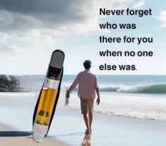 a man walking on the beach with a surfboard in his hand and a message written below it