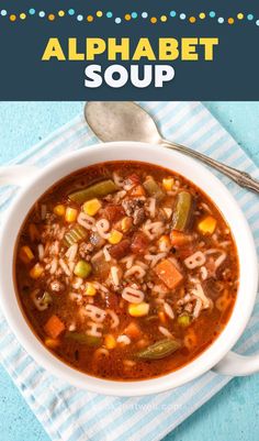 a bowl of soup with noodles, carrots and celery on the side