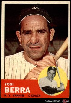 a baseball card with a man holding a bat on it's shoulder and smiling at the camera