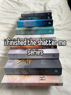 five books stacked on top of each other with the words i finished the shattered me series