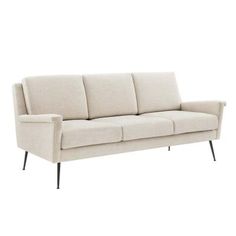 a white couch with black legs on a white background and a light colored upholstered sofa