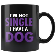 i'm not single i have a dog black coffee mug with purple lettering on it