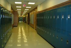 an empty hallway with lockers and the words propensity to discuss