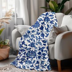 This soft and cozy Toile Throw Blanket in a blue floral French Country design makes a perfect wedding gift, baby shower gift, or Mother's Day gift. As a beautiful piece of home decor, this blue and white blanket can be used as a cozy sofa blanket, living room accent, or bedroom throw, adding a touch of French country or coastal decor to any space. This cozy blanket also works wonderfully as a baby or crib blanket, making it a thoughtful gift for mom or any special lady in your life. Whether drap Blue And White Blanket, Blanket Living Room, Blanket Wedding, Blanket Making, Floral Throw Blanket, Bedroom Throw, Blue Throw Blanket, French Country Design, Cozy Sofa