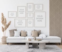 a living room with white couches and pictures on the wall above them in neutral colors