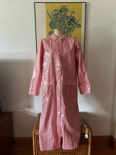 This great Talbots raincoat is a great piece to have for fall. It's a red and white long raincoat with pockets in the front. It's a size small (S) but has room. NO RETURNS. Red Winter Raincoat, Pink Oversized Outerwear For Daywear, Red Long Sleeve Raincoat For Winter, Oversized Pink Outerwear For Daywear, Pink Waterproof Raincoat For Fall, Pink Raincoat For Fall Rainy Weather, Pink Fall Raincoat For Rainy Weather, Pink Waterproof Long Sleeve Raincoat, Spring Long-sleeved Raincoat With Button Closure