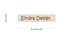 an embroidered label with the word edna design on it, in brown and white colors