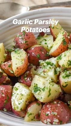 garlic parsley potatoes in a white bowl