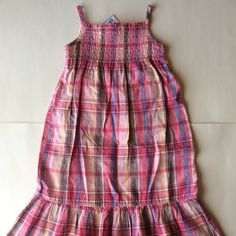 New! Toddler Girl Size 2t. Soft, Cotton Linen Sundress. Pink Brown And Blue Plaid. Shirred Peplum Ruffle Hem. Elasticized Smocked Neckline. Spaghetti Straps. A-Line Silhouette. Includes Matching Diaper Cover. 5z Girls Halter Dress, Burgundy Long Sleeve Dress, Pink Plaid Dress, Girls Navy Dress, Navy Sweater Dress, Linen Sundress, Girls Sundress, Pink Sleeveless Dress, Camo Dress