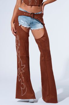 You’re smokin’ hot, babe. The AKIRA Label Smoke Hour Suede Chaps In Brown are crafted in a lush, slightly stretchy suede fabrication and features a bottomless chap silhouette, a functional silver metallic buckle front waist belt, dual side pockets, contour seaming, Western-inspired embroidered stitching and functional metallic zippers running down each leg. Complete with a lace up back panel, snap-button closures on the pant legs for optional side slits, and a wide leg silhouette. Pair with the coordinating AKIRA Label Smoke Hour Suede Corset In Brown for a wildin’ ensemble. - 92% Polyester 8% Spandex- Slight Stretch- Imported (all measurements approximate from size small)- 43” Waist to Hem- 31” Inseam- Model is 5’7”Product ID: 433797 (all measurements approximate from size 1X)- 44.5” Wais