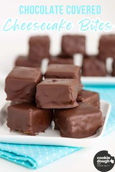 chocolate covered cheesecake bites on a white plate