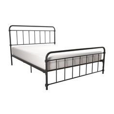 a metal bed frame with white sheets and pillows on it, against a white background