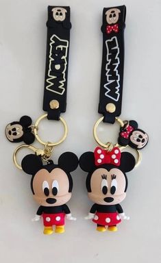 two mickey and minnie mouse key chains