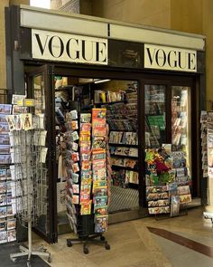 there is a store front with magazines on display