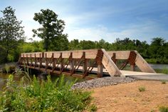 a wooden bridge over a body of water