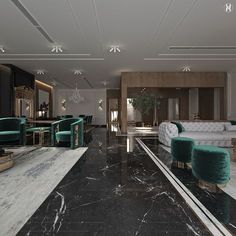 an elegant living room with marble flooring and green velvet sofas in the center