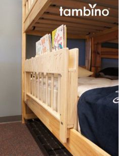 there is a bunk bed with books on it