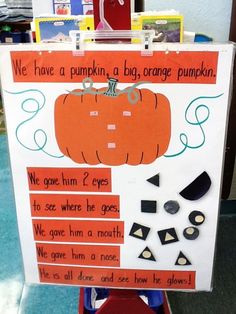 a bulletin board with pumpkins on it and words written in different languages to describe