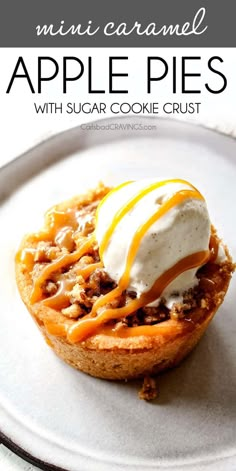 an apple pie on a white plate topped with ice cream and caramel drizzle