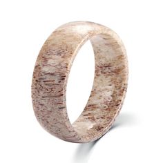 Celebrate each day in style as you wear this Wedding Band by Innovato Design. The fresh-looking design of this piece of jewelry is perfect for matching with your cool and trendy outfits. Made of elk antler, this amazing wedding band has a smooth and shiny outer band and a smooth, polished, and sleek inner band. The main surface of this ring is made of elk antler so as the inner surface. This ring is scratch-resistant, making you wear it for a long time without worrying about it being damaged by bumping on surfaces. Also, this ring is waterproof so you can wear it even when you wet your hands. Moreover, you can wear this ring on your engagement.  Product Highlights:   Made of elk antler  Ring size: 6, 6.5, 7, 7.5, 8, 8.5, 9, 9.5, 10, 10.5, 11, 11.5, 12, 12.5, 13, 13.5, 14, 14.5, and 15  Sur Deer Antler Wedding Rings, Deer Antler Wedding Band, Deer Antler Wedding, Hunting Jewelry, Antler Wedding Rings, Antler Wedding Band, Antler Wedding, Wood Inlay Rings, Wedding Ring For Him