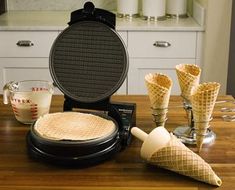 some waffles and ice cream sitting on a table with an instagram button