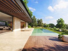 an outdoor swimming pool next to a wooden deck