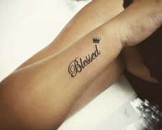 a woman's arm with a tattoo that says beloved on the left side of her arm