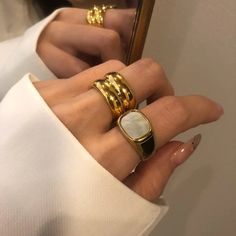 Inspired by the modern glamour at NYC, this Duo Ridge Ring gives you the illusion of wearing two bands at once. Designed by UPPER x Mason & Madison Co. What You Get:• NYC Duo Ridge Ring• FREE & FAST Trackable U.S. Shipping• Worry-FREE 30-day Warranty• Hassle-FREE Returns• 24/7 Customer Care Service Add to Cart TODAY, and Get it now while stock last ! DETAILS SHIPPING & RETURNS • Materials: 18K gold plated titanium• The product is tarnish-resistant and hypoallergenic • Free Shipping• Delivery Tim Thick Gold Ring, Nails Elegant, Gold Jewelry Gift, Thick Ring, Modernist Ring, Blazer Style, Shell Ring, Pattern Ring, Chunky Rings