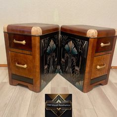 two wooden drawers with decorative designs on them