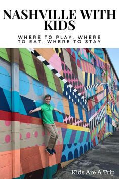 a young boy leaning against the side of a colorful wall with text overlay reading nashville with kids where to play, where to stay