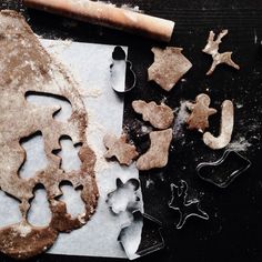 some cookie cutters and other items on a table