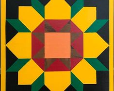 an abstract painting with yellow, red and green shapes on black paper in the shape of a sunflower