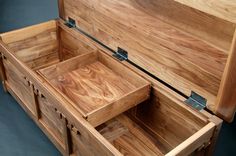 an open wooden box with two drawers