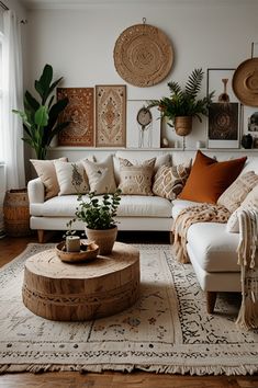 a living room filled with lots of furniture and decor on top of a wooden floor