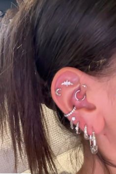 a woman with ear piercings on her ears