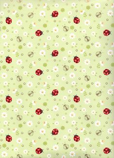 a green background with ladybugs and daisies