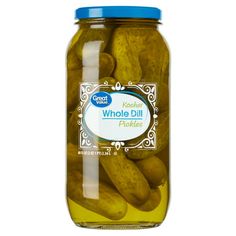 pickles in a glass jar on a white background