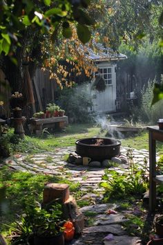 a fire pit sitting in the middle of a yard