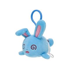 a blue stuffed animal keychain with a rabbit on it's face and ears