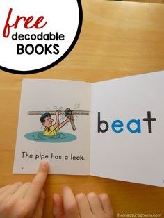 a person is reading a book with the word beat in front of them on a table