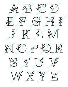 the alphabet is made up of letters and numbers with leaves on each letter, as well as