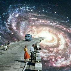 two people standing on the side of a road looking at an image of a spiral galaxy