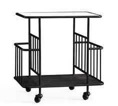 a black metal cart with wheels and a glass table top on one end, against a white background