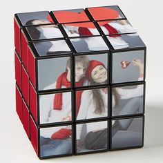 a rube - cube with pictures of people in the middle and one woman on top