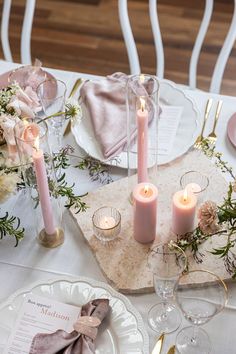 Image of pink candles on wedding table Candle Pillar Centerpieces Wedding, Pillar And Taper Candle Centerpiece, Pink Taper Candles Wedding, Baby Shower Candle Centerpieces, Tea Light Centerpiece, Vintage Pastel Wedding, Light Pink Candles, Pink Pillar Candles, Candle Centrepiece