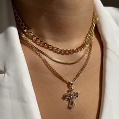 Make a statement with our Eminence Cross Necklace! This multicolor CZ cross charm hangs on a stylish 14K Gold-Filled curb chain. The Eminence Cross Necklace is the perfect piece to add a little glamour and pop of color to your look! Product Details: 13.5mm 14K Gold-Filled Curb Chain 35mm Multi-Colored CZ Cross 16" + 2" Extender Not Water-Wearable Made in Scottsdale, AZ Cross Necklace Aesthetic, Gold Necklace Aesthetic, Necklace Stacking, Xoxo Jewelry, Necklace Aesthetic, Cross Necklace Women, Necklace Stack, Expensive Jewelry Luxury, Indian Goddess