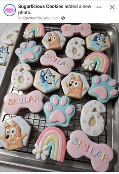 some cookies that are on top of a cooling rack with the words sugarlicious cookies added