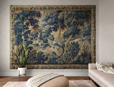 a living room with a large tapestry on the wall