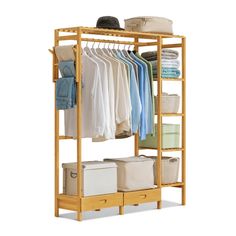 an open closet with clothes and baskets on it