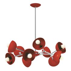 a red and white chandelier hanging from a metal rod with eight lights on each end